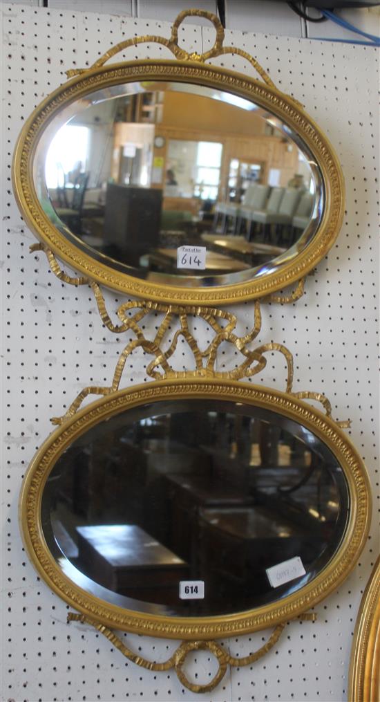 Pair of Victorian gilt oval mirrors